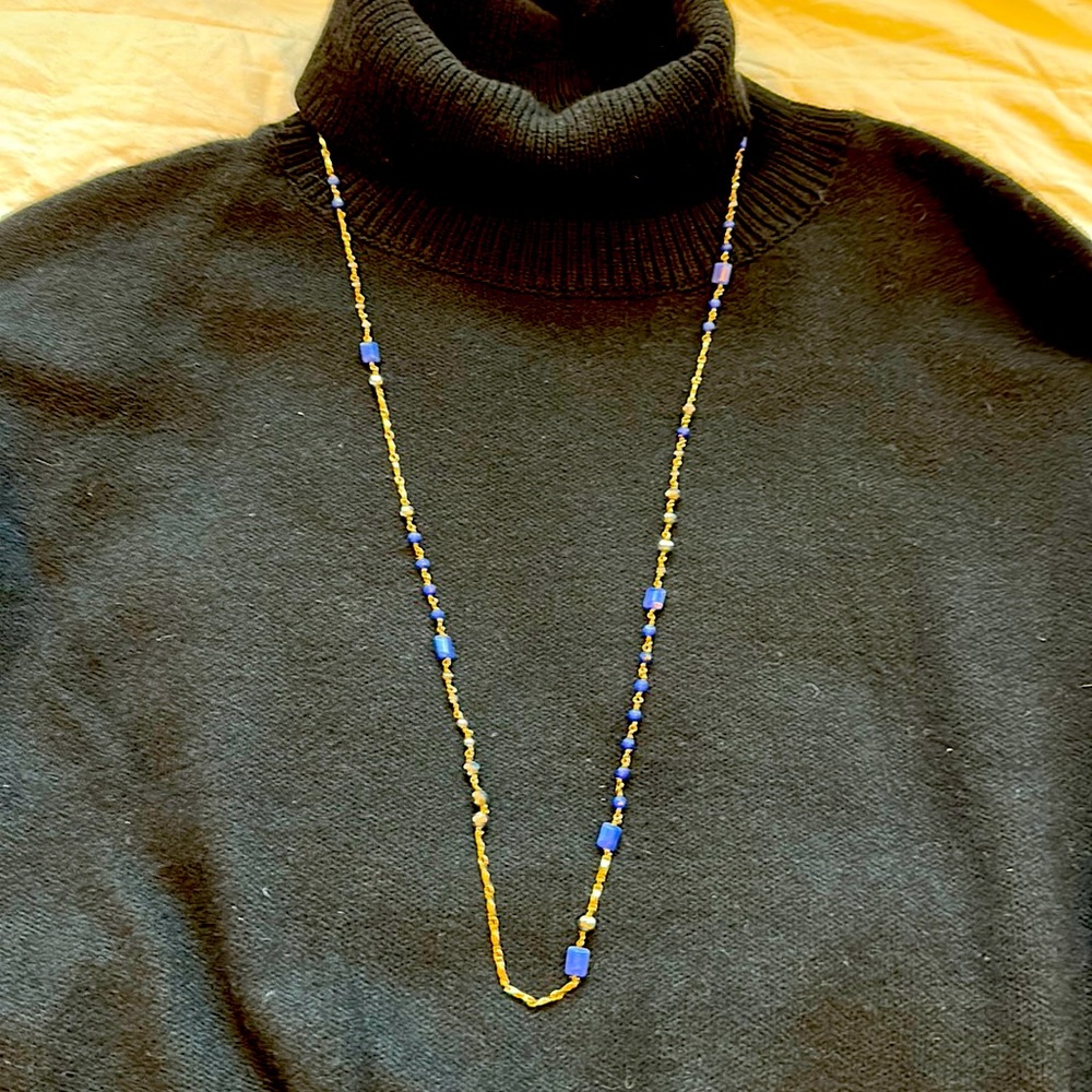 Kendra Scott long gold necklace with blue stones